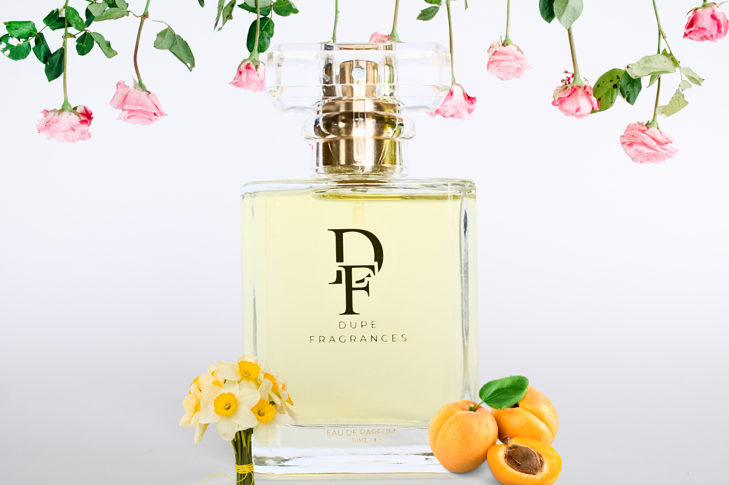 50ml Dupe Fragrances perfume Velvet Petal inspired by Narcisse by Chloe. Clear bottle on background of roses.