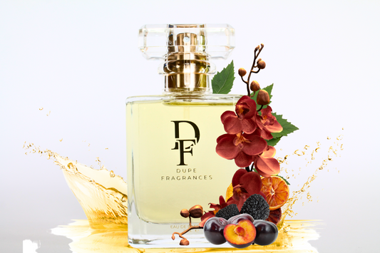 50ml dupe fragrance perfume Mystic Bloom inspired by Black Orchid by Tom Ford. Clear bottle gold label on gold water spray background. orchids, plum and orange