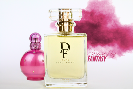 50ml dupe fragrances perfume Dreamland Bliss inspired by Fantasy by Britney Spears. Clear bottle gold label on pink mist background