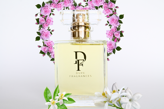 50ml Dupe Fragrances perfume Golden Letters inspired by Love Story by Chloe. Clear bottle with gold label on background with roses.
