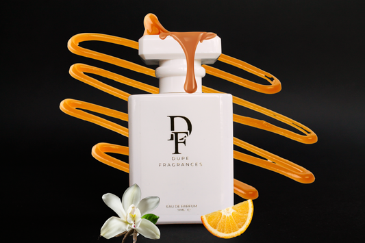50ml dupe fragrances perfume Sugar Stiletto inspired by Bon Bon by Viktor & Rolf. white bottle with gold label on background with caramel drizzle