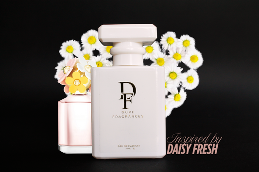 50ml Dupe Fragrance perfume Meadow Whisper inspired by Daisy Eau So Fresh by Marc Jacobs.  While bottle with gold label on background of daisies.