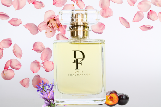 50mlDupe Fragrances perfume Velvet Vice inspired by Decadence by Marc Jacobs. Clear bottle with gold label on background of pink petals