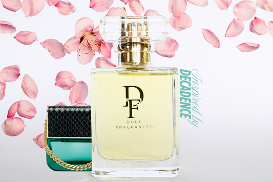 50mlDupe Fragrances perfume Velvet Vice inspired by Decadence by Marc Jacobs. Clear bottle with gold label on background of pink petals