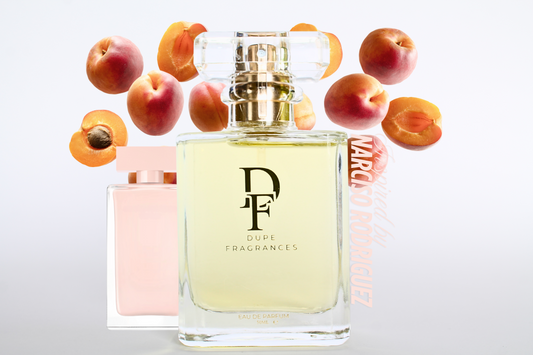 50ml dupe fragrance perfume Skin Scent inspired by Narciso Rodriguez for Her. Clear bottle with gold label on background of peaches